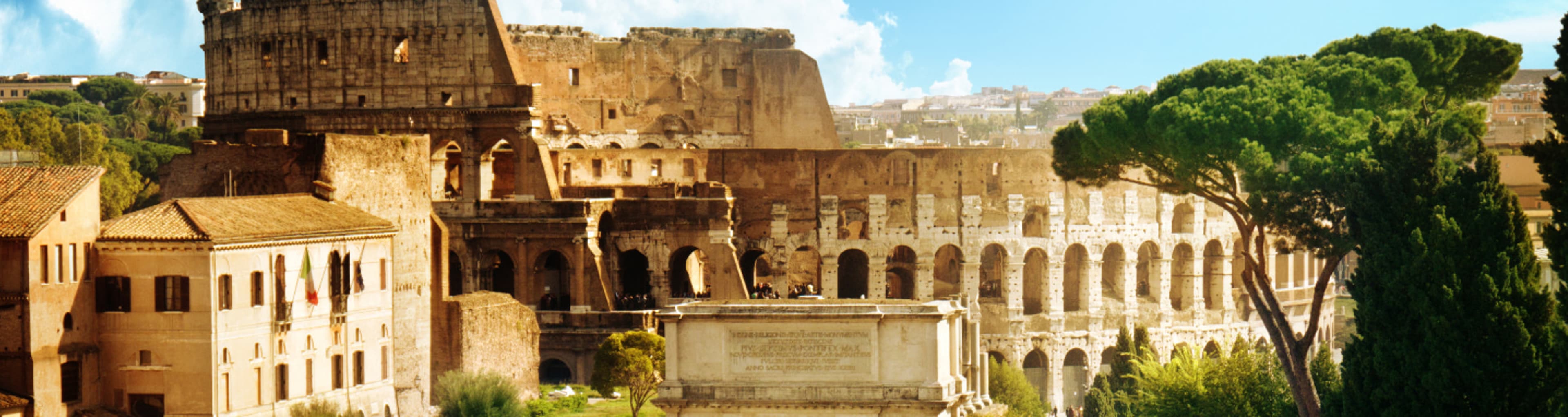 Rome's Colosseum among lush green trees