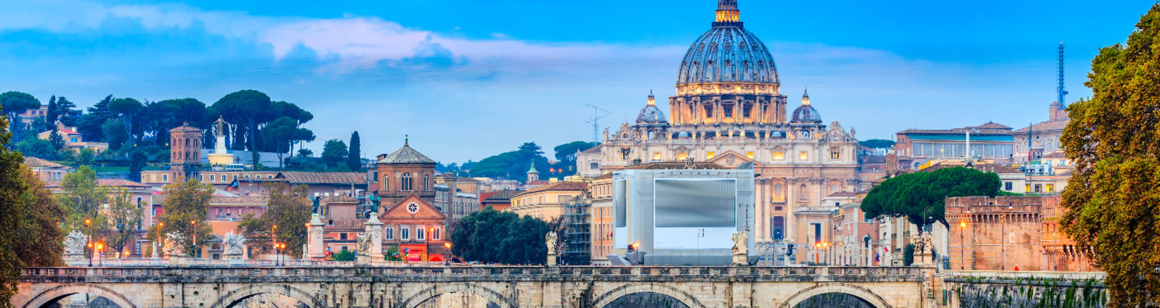 Saint Peter's Basilica and Ponte Sant Angelo reflected in the River Tiber