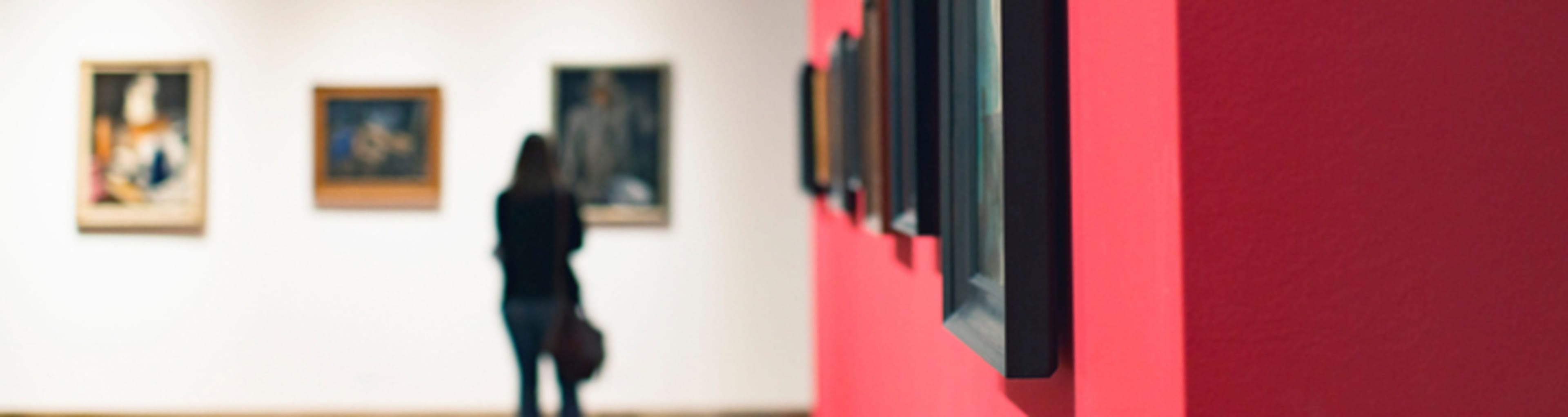 Woman viewing art in a gallery