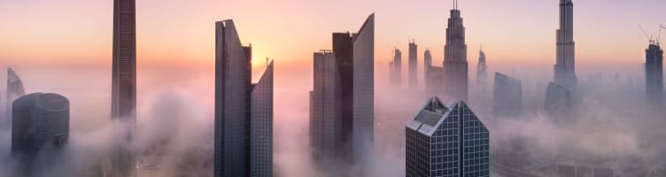 The towers of Dubai in the morning fogs of winter