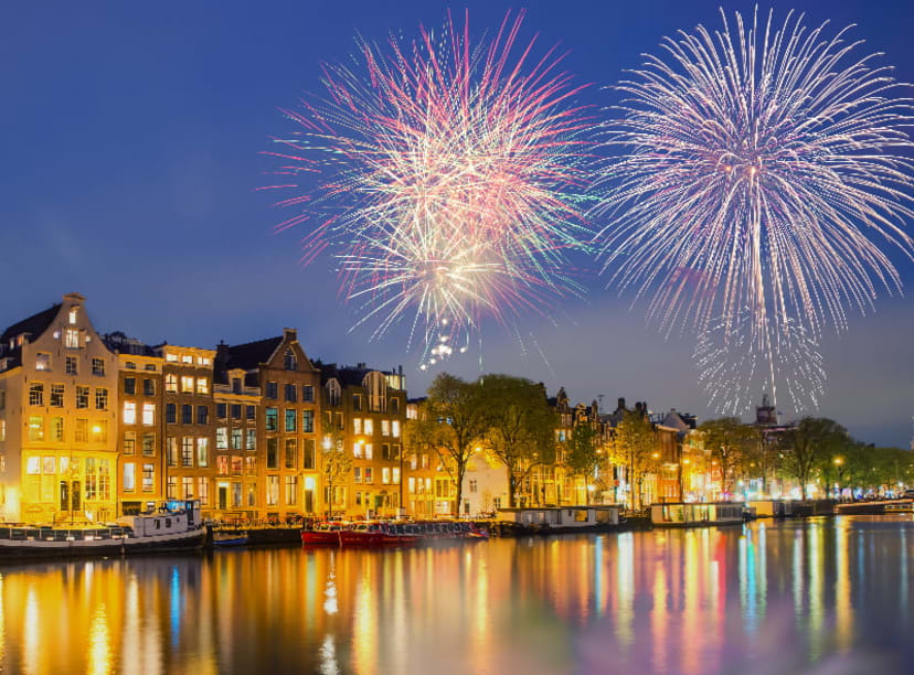 Fireworks over the iconic Amsterdam canal houses