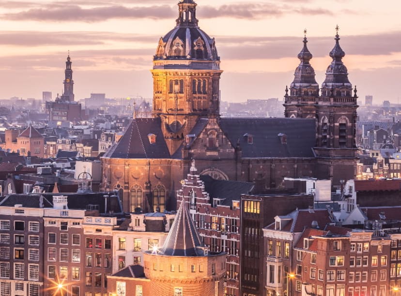 Elevated view of Amsterdam's Church of St. Nicholas among surrounding city