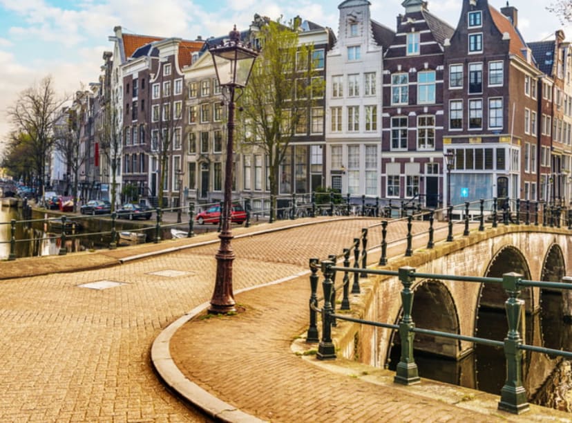 Canal houses over a canal bridge