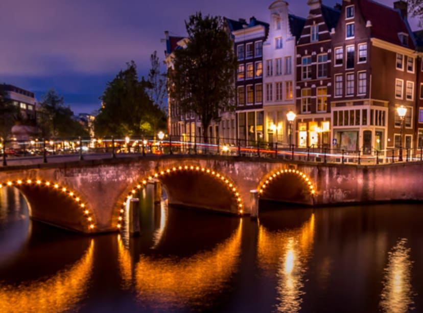 Bridge in Amsterdam illuminated at night