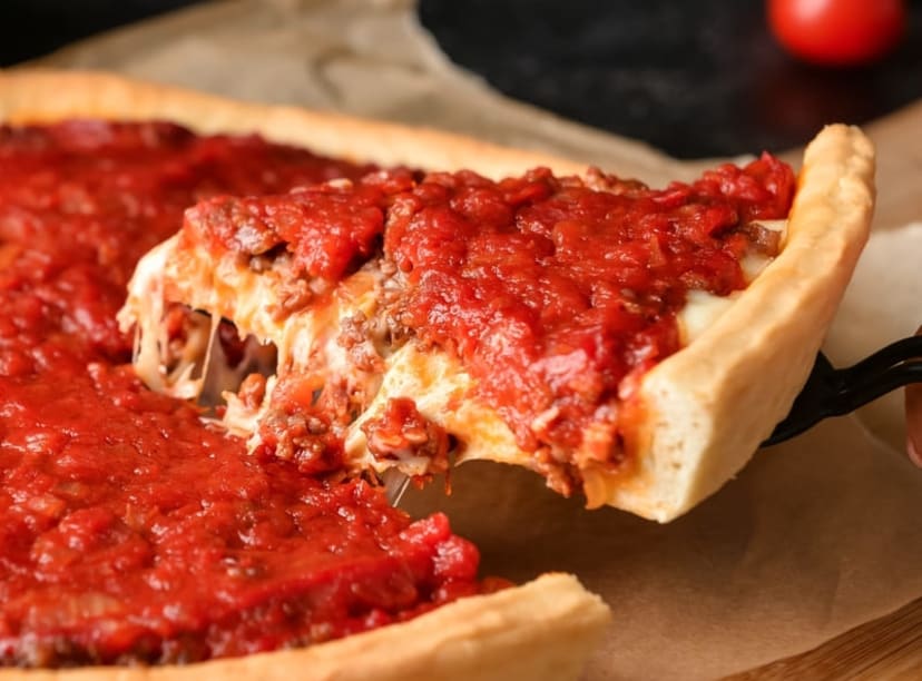 A slice of Chicago-style deep-dish pizza