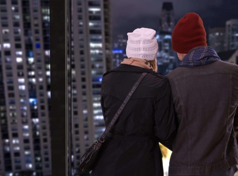 A couple enjoying the view from a Chicago tower