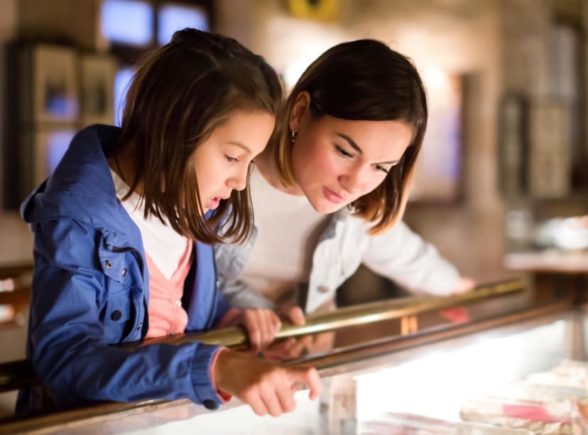 A mother and child check out a Chicago museum exhibit