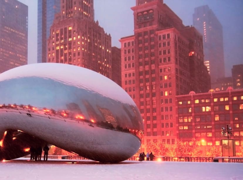 Chicago's bean sculpture in the snows of Christmas