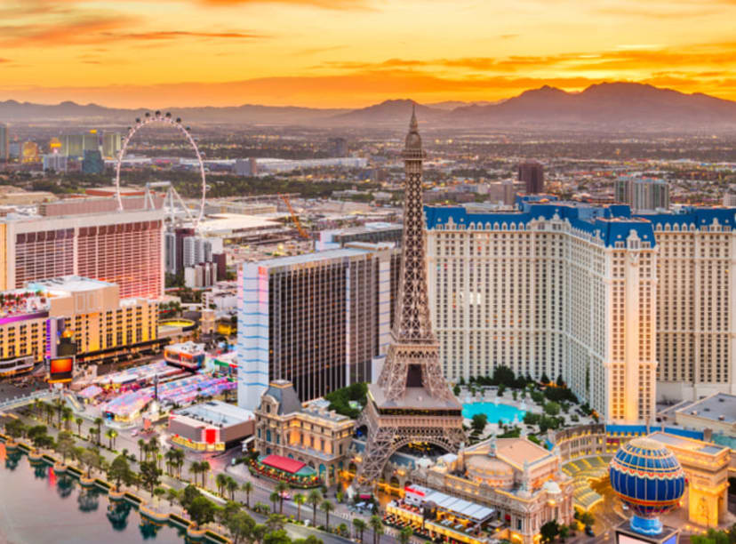 Sunset over the Las Vegas skyline, with the replica Eiffel Tower in the foreground