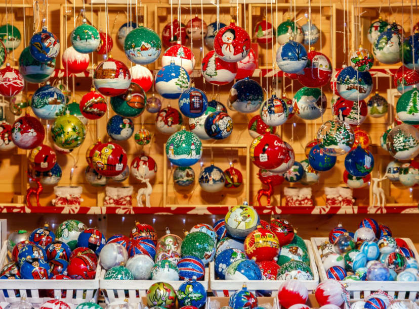 Decorated baubles at a wooden market stall