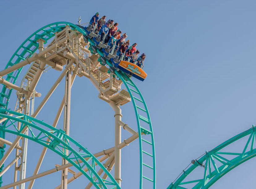 Riders at the top of the drop on the HangTime rollercoaster at Knott's Berry Farm, LA.