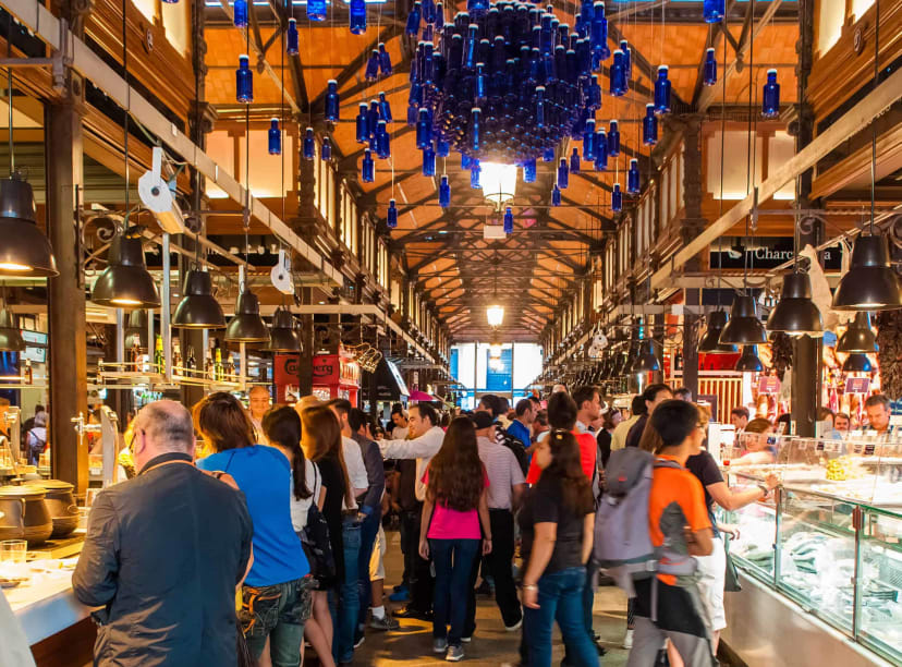 People shopping in Madrid food market