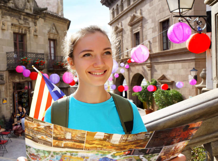 A tourist with a map in Madrid.