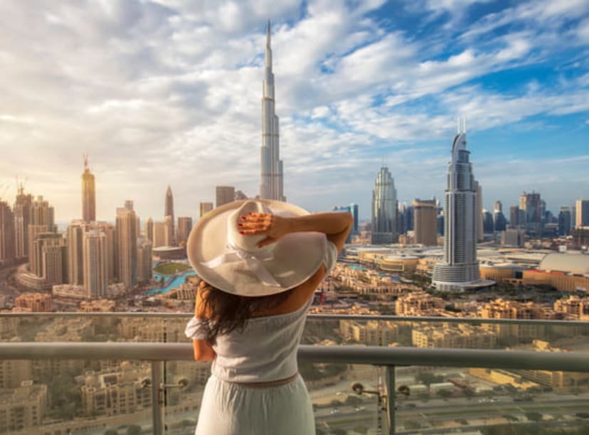 Woman looking out into the Dubai skyline