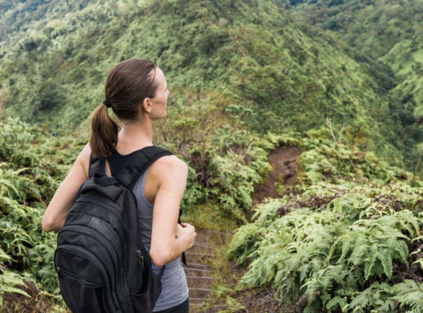 Hiker in the mountains of Oahu island, Hawaii.