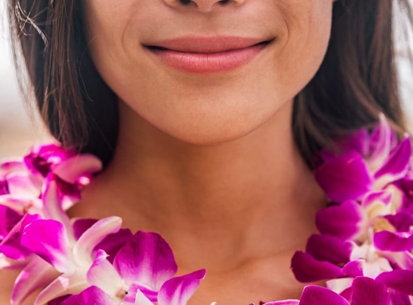 Woman wearing a traditional Hawaiian lei garland around her neck