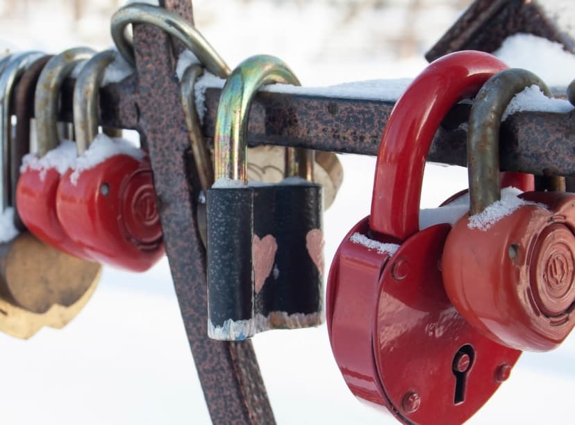 Close up of love locks attached to the Pont des Arts in Paris