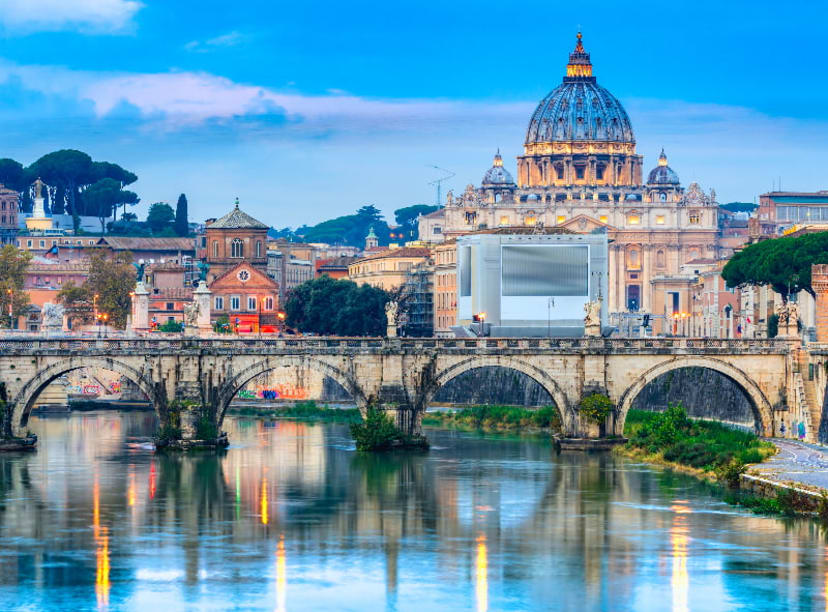 Saint Peter's Basilica and Ponte Sant Angelo reflected in the River Tiber