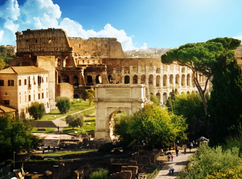 Rome's Colosseum among lush green trees