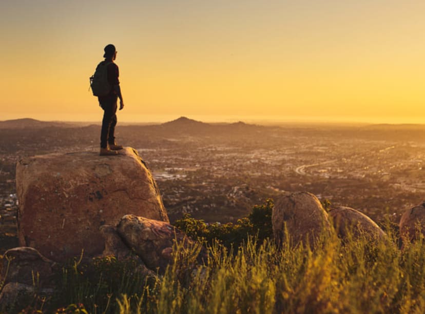 A hiker on the cliffs in San Diego