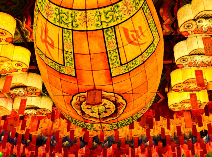 Huge barrel shaped golden lantern and smaller lanterns