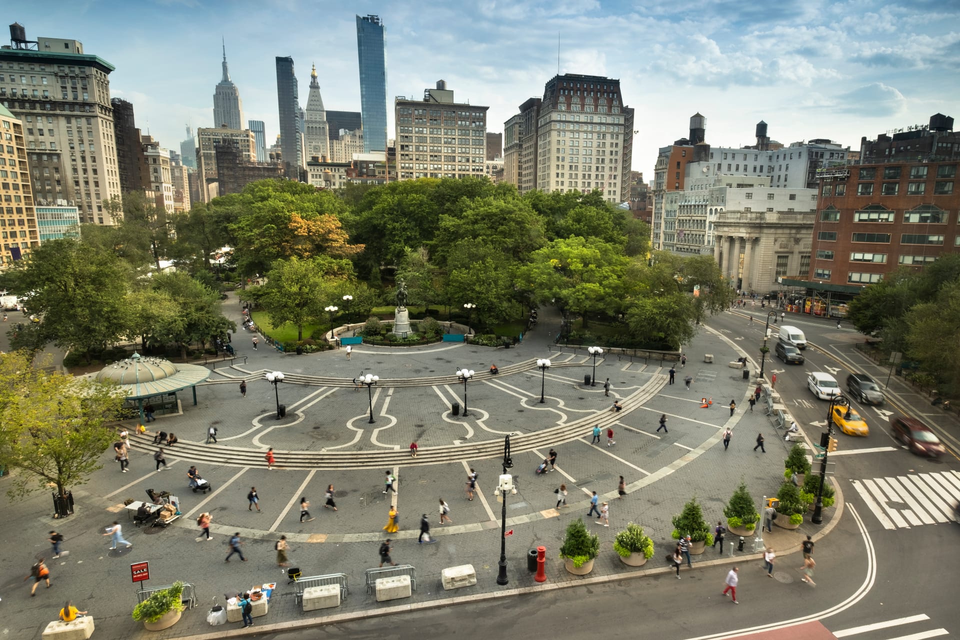 aerial-view-people-walking-through-union-square-market