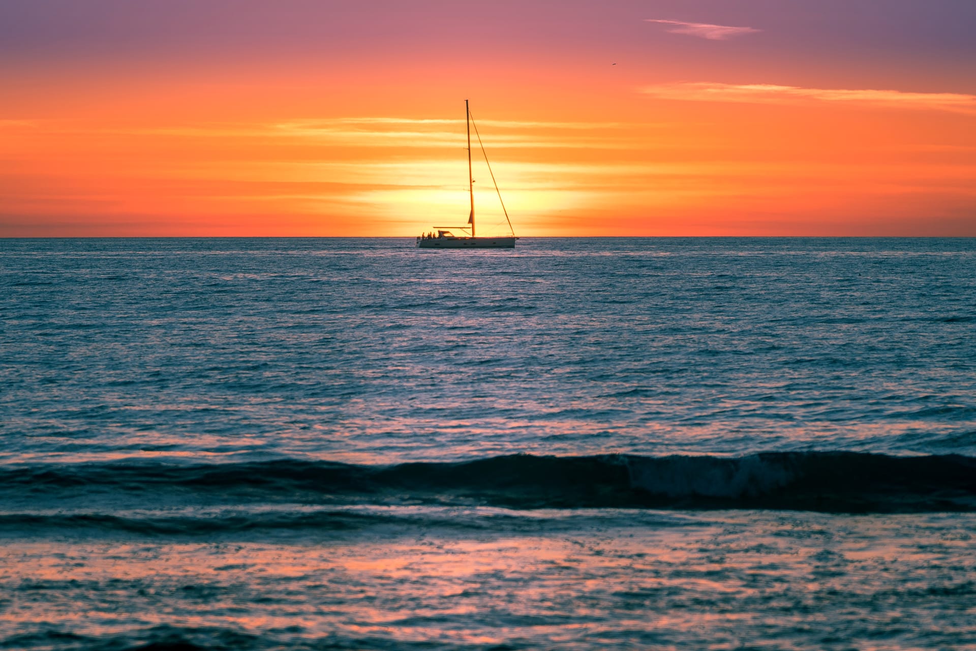 beach-sailboat-sunset