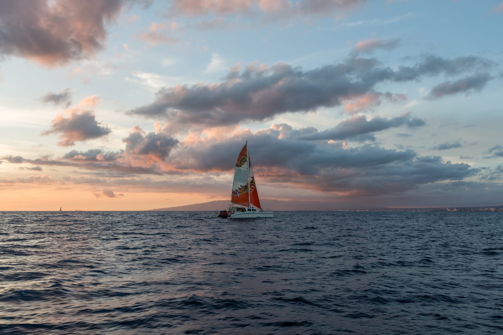 beautiful-sunset-vista-sailboat-foreground
