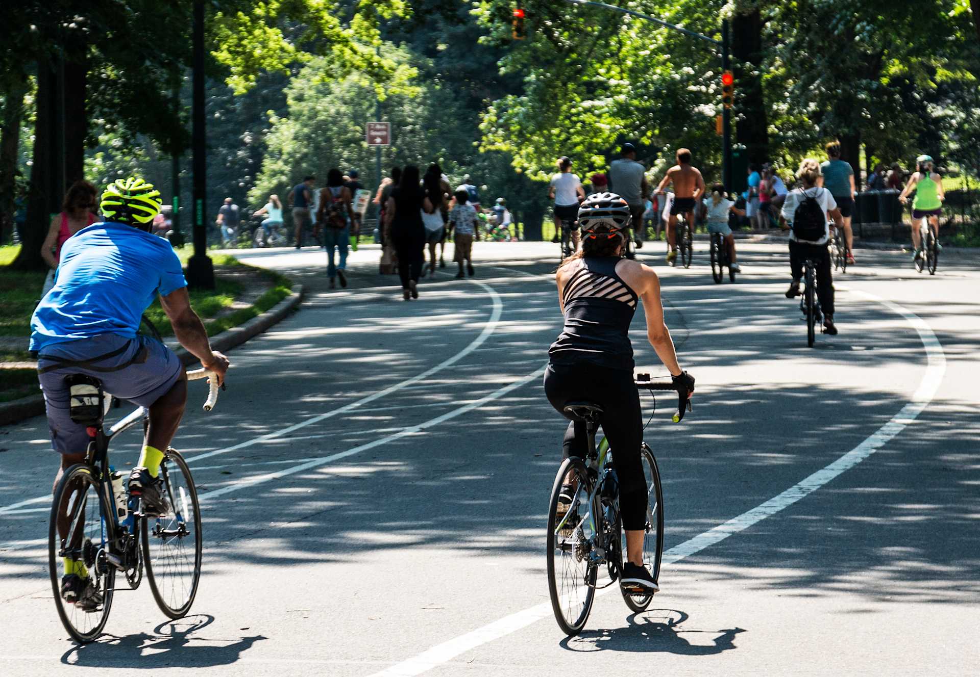 couple riding through central park in nyc