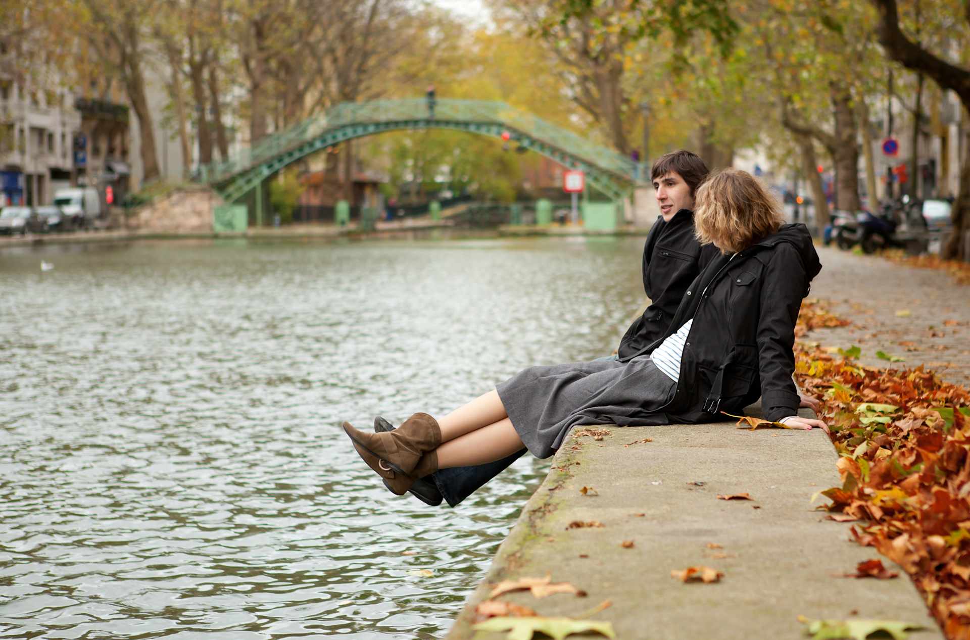 Couple Sitting on the Side of Canal Saint Martin