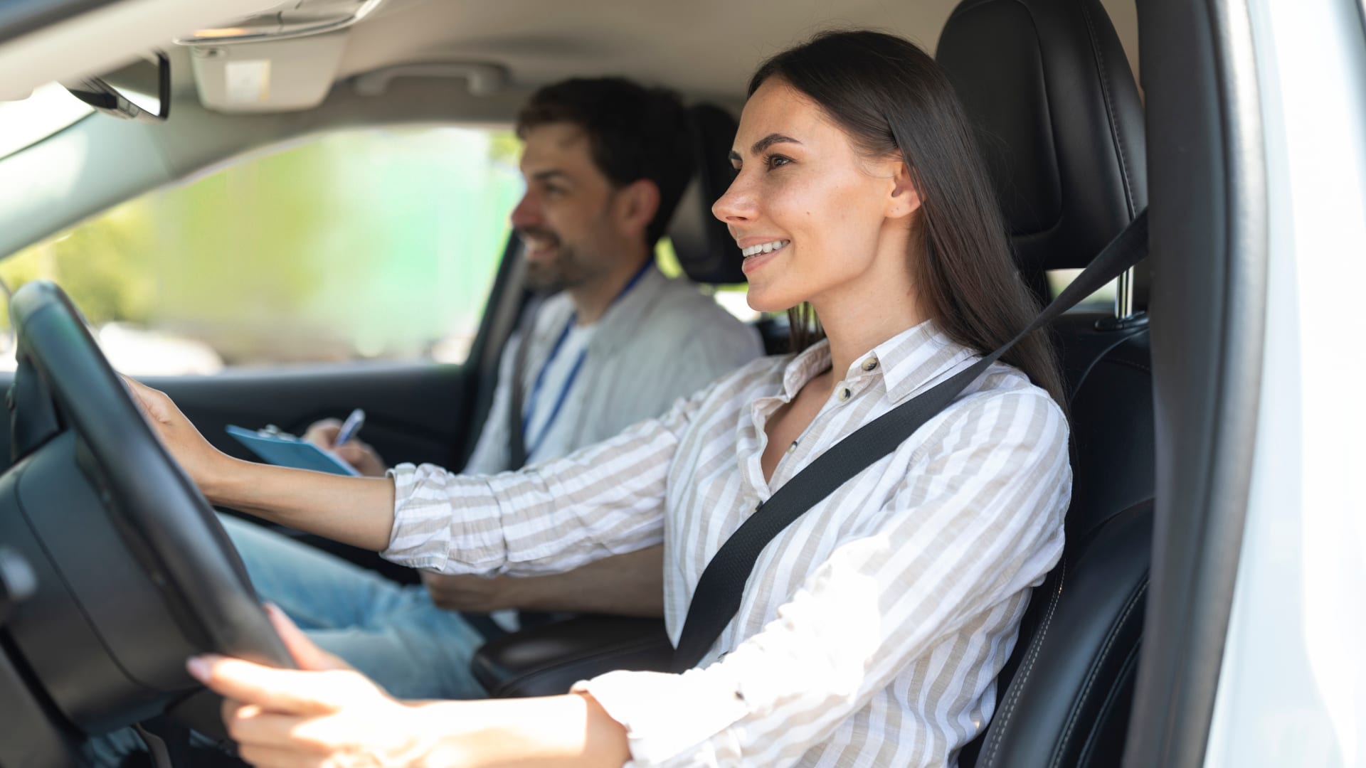 cheerful-confident-pretty-young-woman-sitting