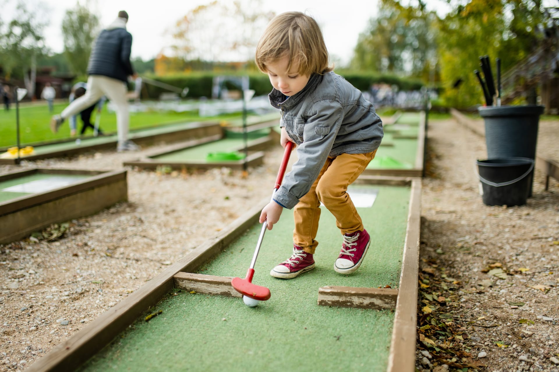 Child Playing Adventure Golf
