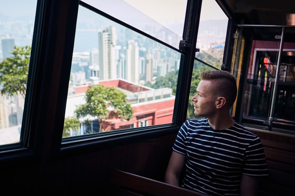 Man on the Peak Tram in Singapore