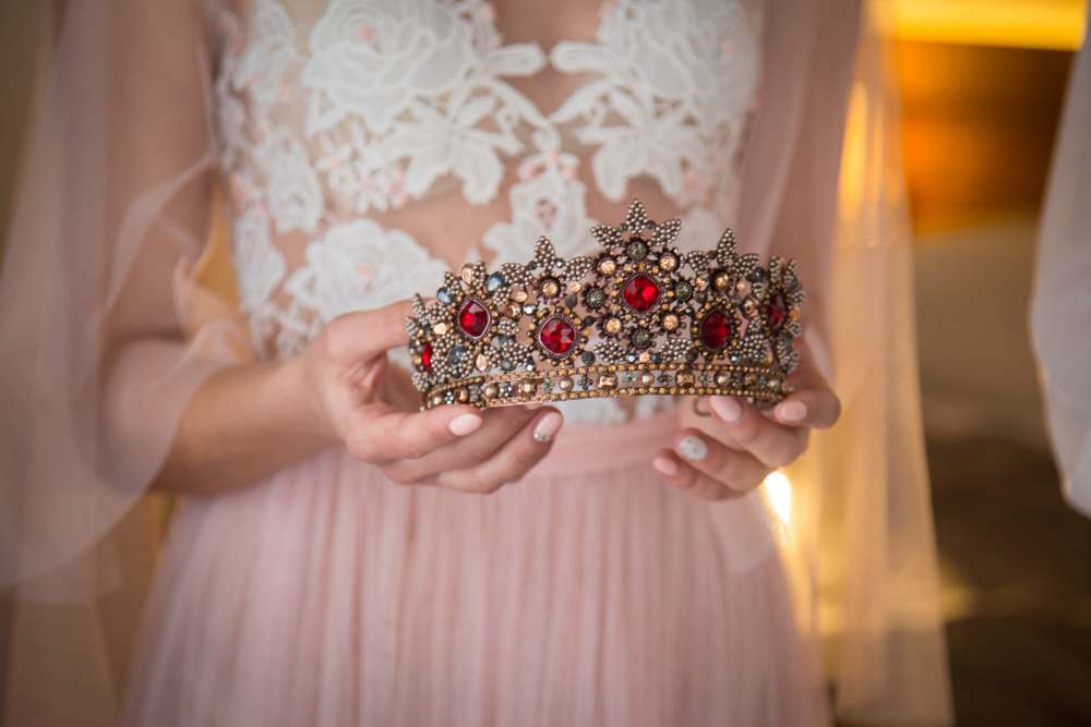 Woman holding a crown