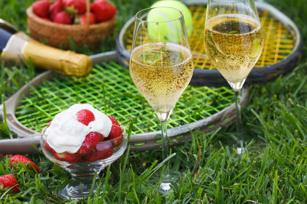 Strawberries, cream, bubbly and tennis racquets