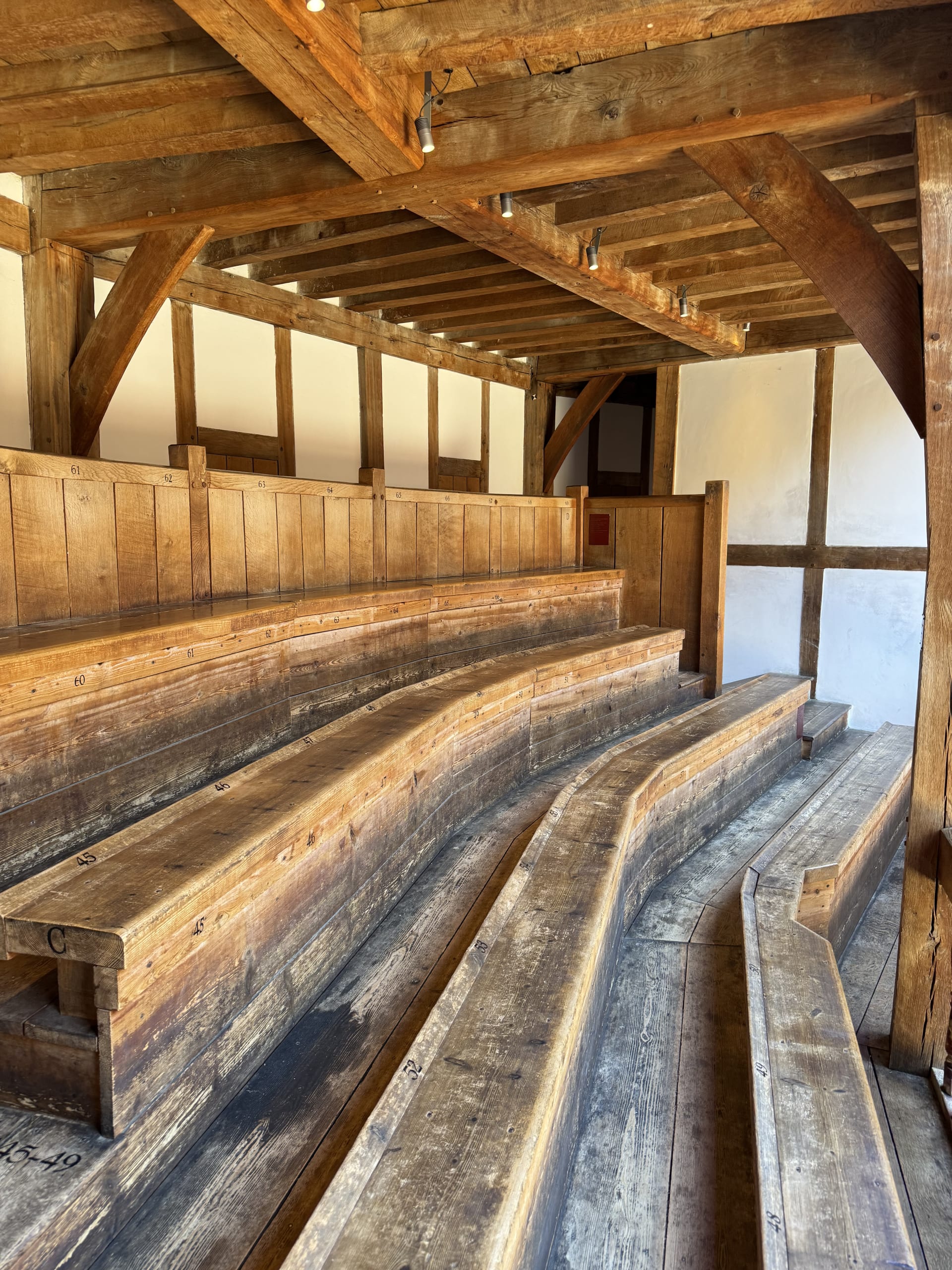 The bench seating inside the Globe Theatre