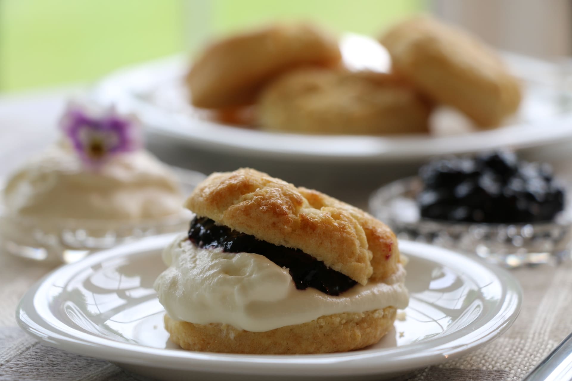 Scone with jam and cream