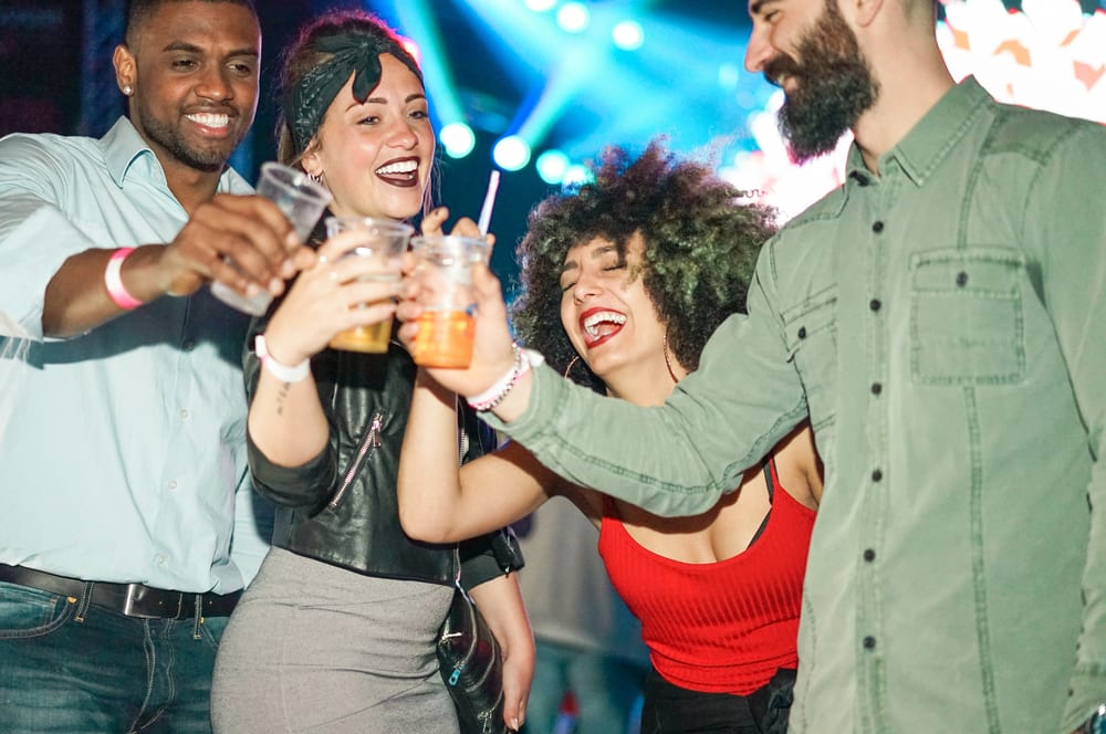 Group of young people partying at the club