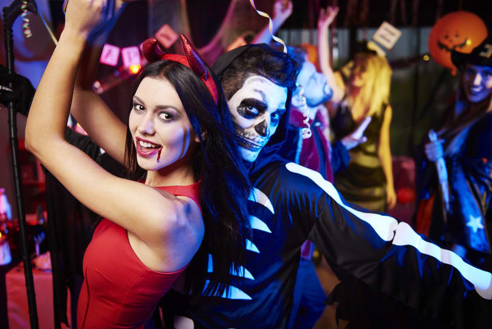 Revelers in Halloween costume