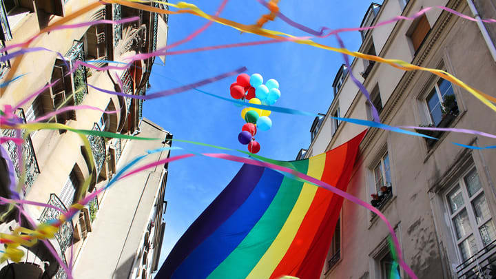 Balloons and rainbow flags at Paris Pride