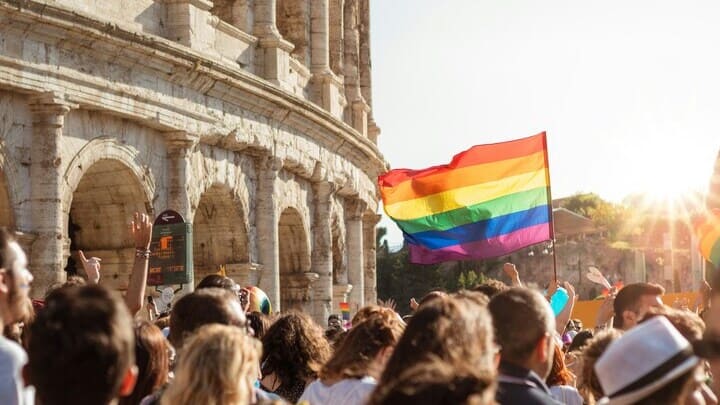 Pride parade in front of the Colosseum in Rome