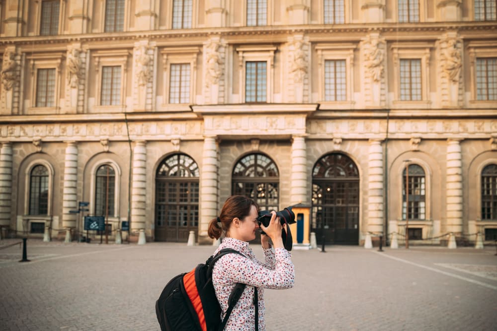 Tourists taking pictures at Stockholm's Royal Palace