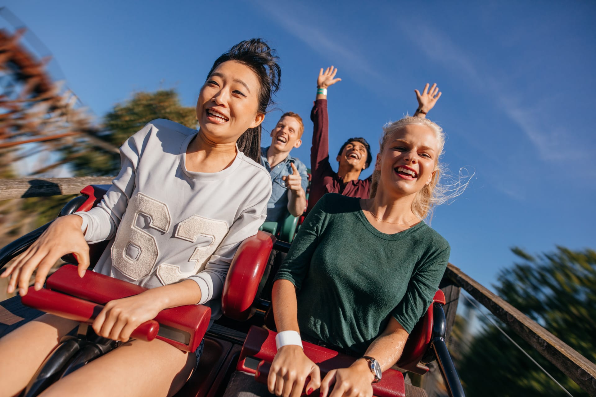 People on a rollercoaster