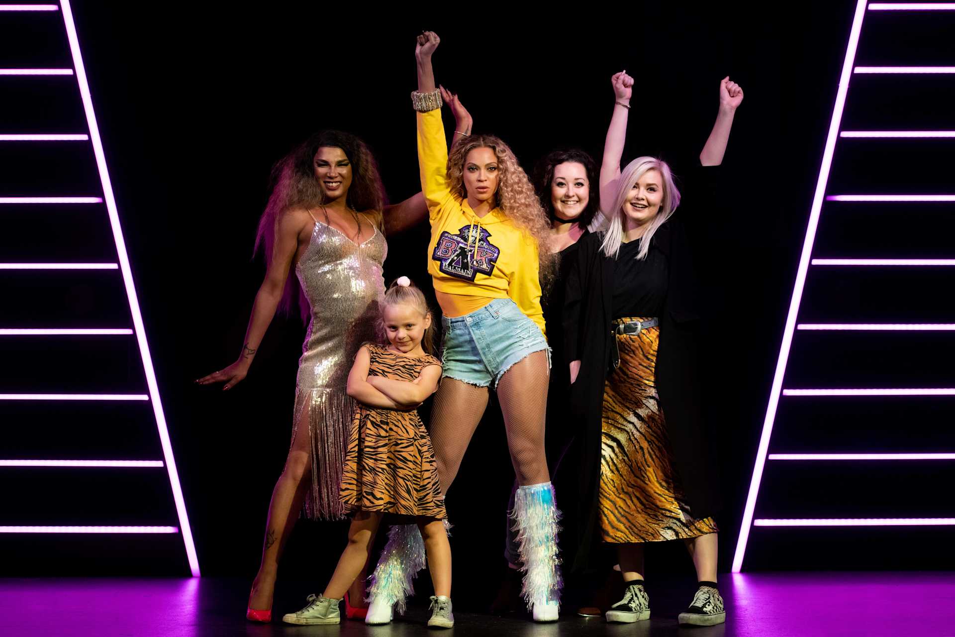 Family Posing with Beyonce at Madame Tussauds London