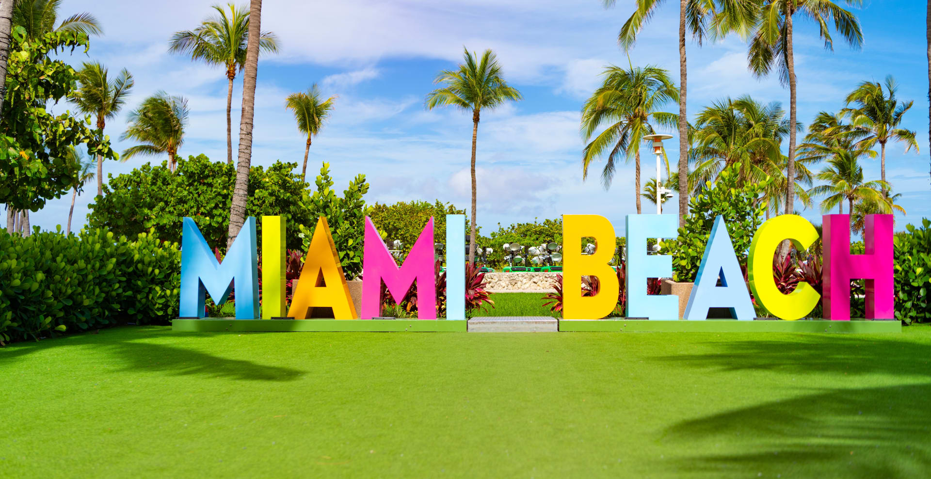 miami-beach-sign-text-surrounded-tropical