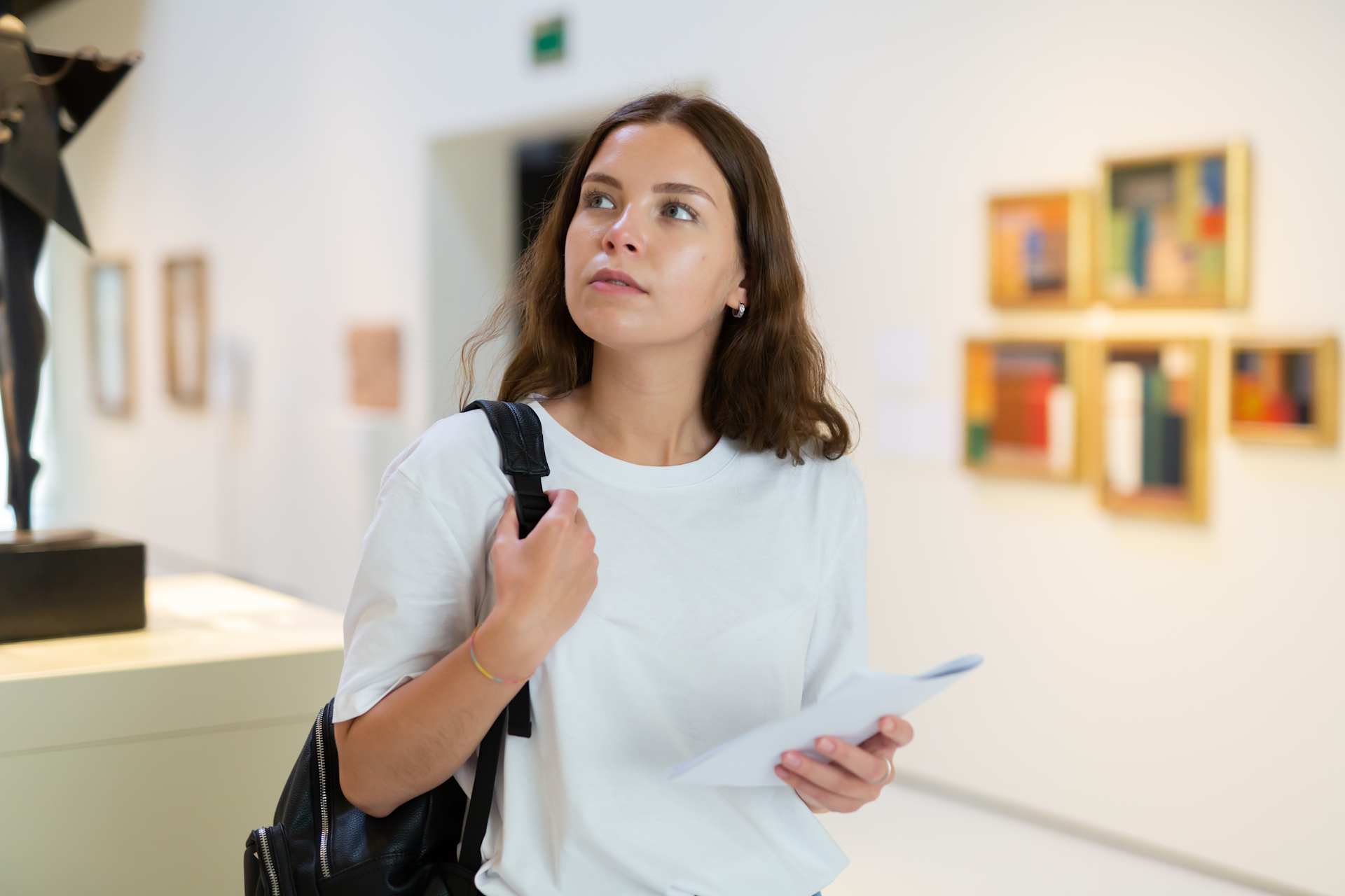 Woman Looking at Art Exhibition