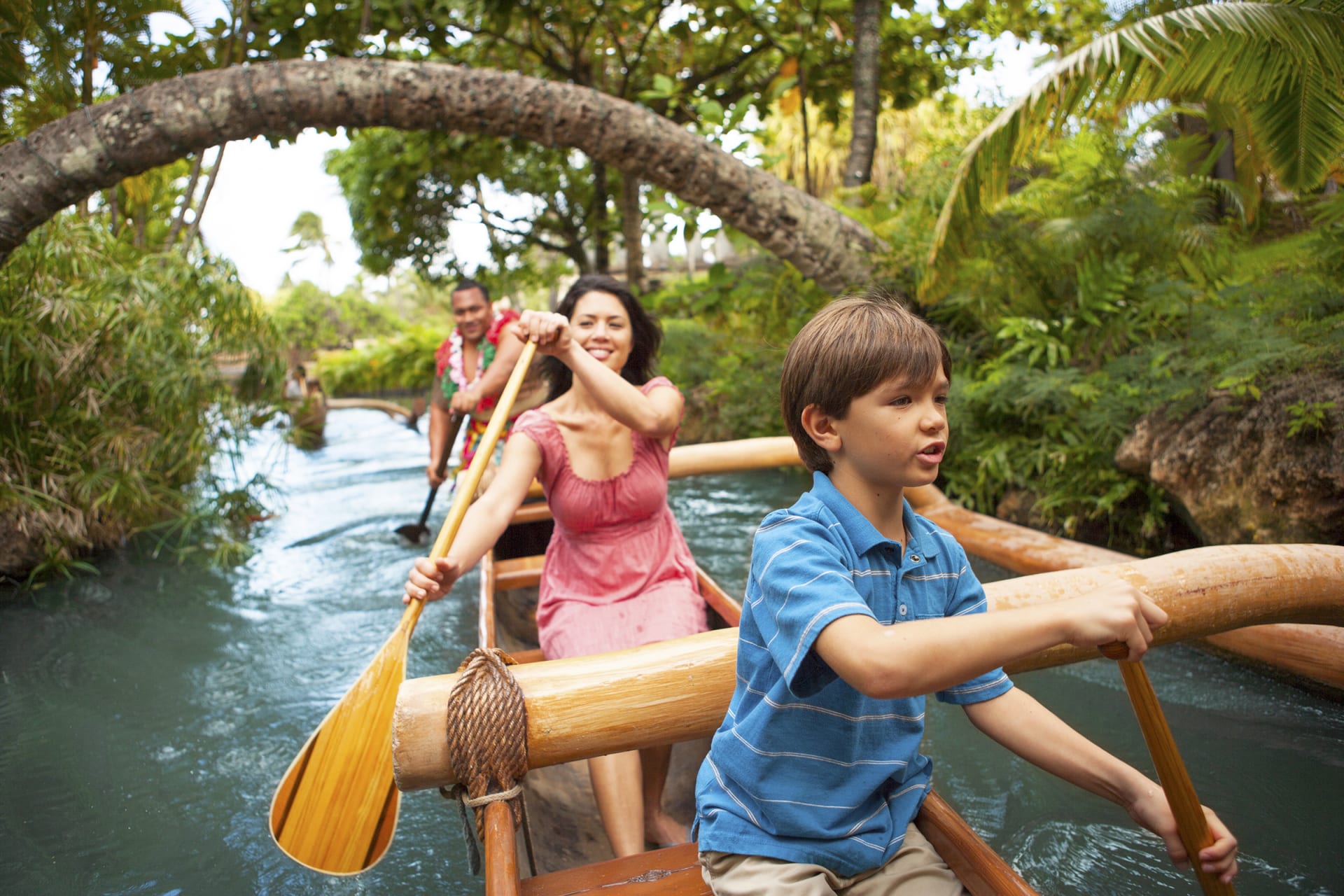Family canoeing at the Polynesian Cultural Center