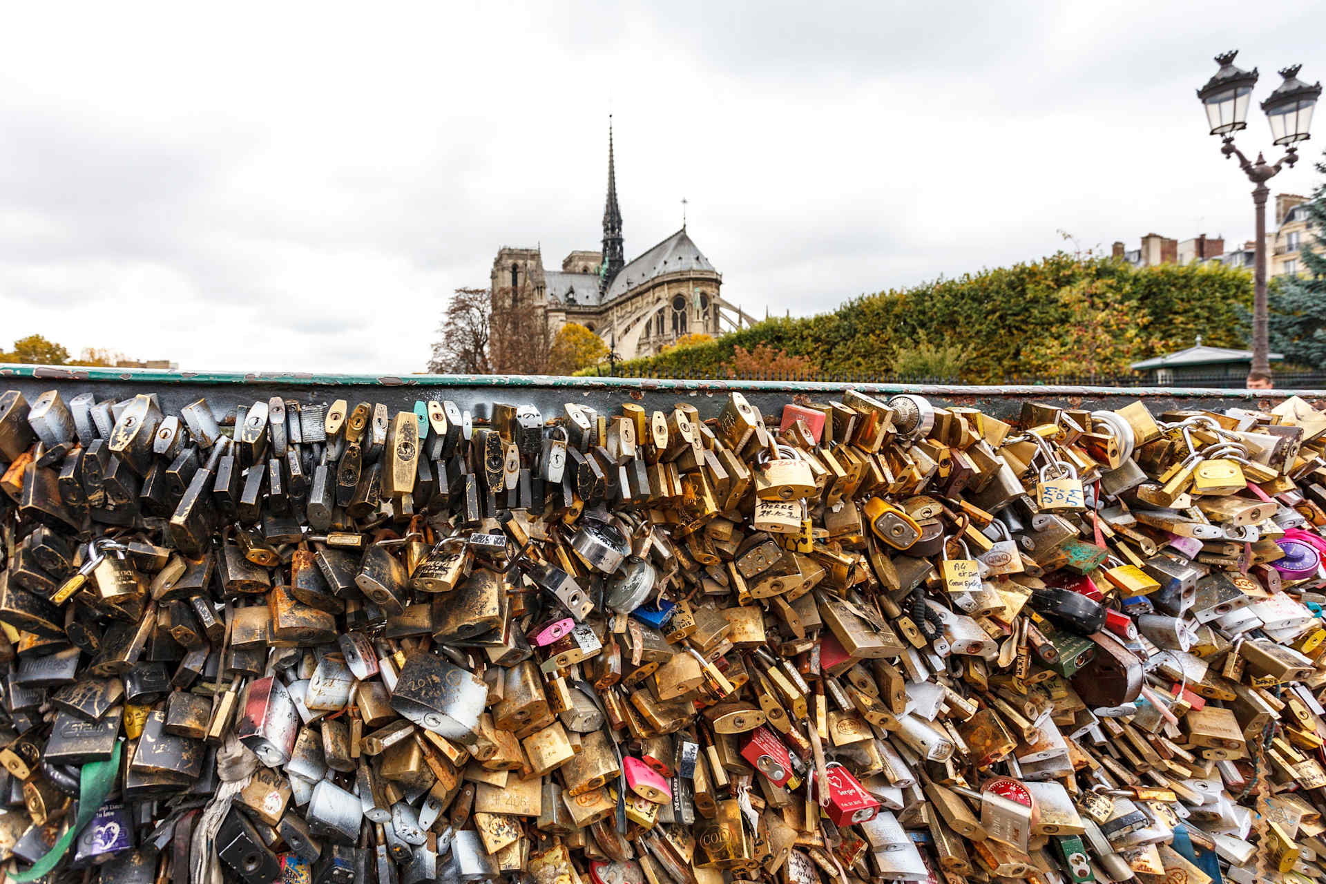 Love Lock Bridge with View of Notre Dame