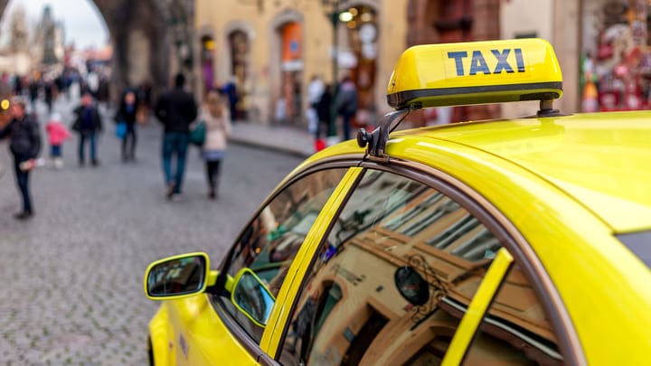 Yellow taxi cab in Prague
