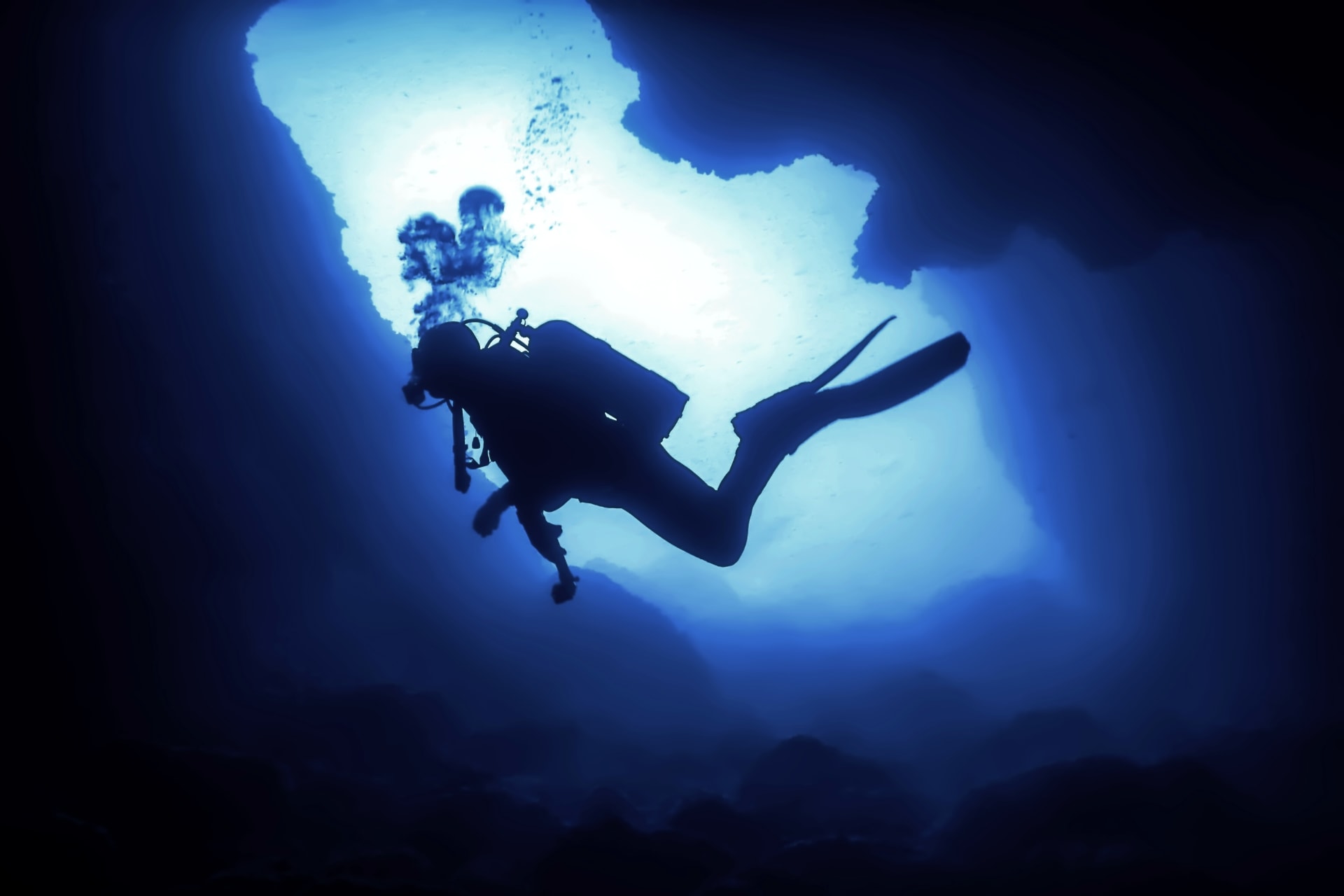 scuba-diver-silhouette-underwater-cave